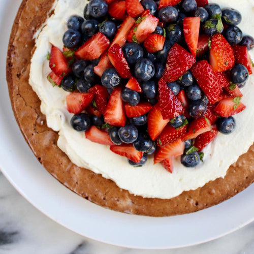BROWNIE TART WITH HONEY WHIPPED CREAM & MINT BERRY SALAD